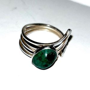 Silver ring with turquoise stone. Size 8 and can be adjusted larger.
